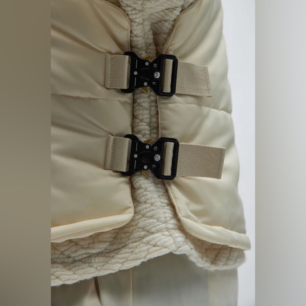 Roller Coaster Puffer Vest" in Off White from the brand Fashion Nova. - Picture 10 of 10